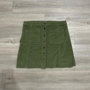 Lightweight green corduroy skirt with buttons